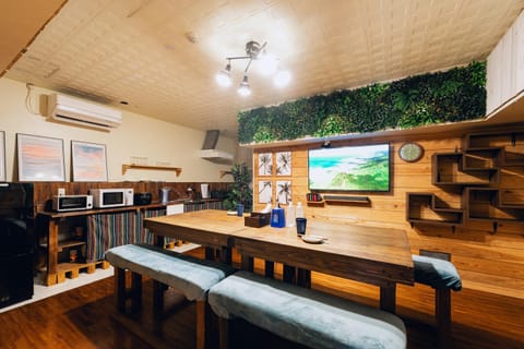 Day, TV and multimedia, Lobby or reception, Dining area, Logo/Certificate/Sign, Text overlay, air conditioner