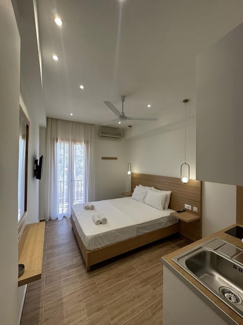 Bed, Bedroom, fireplace, towels