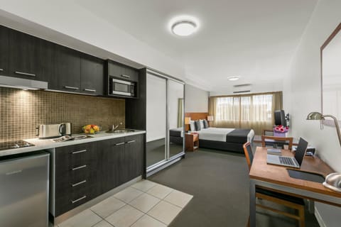 Bed, Kitchen or kitchenette, stove