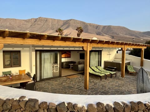 Property building, Patio, Natural landscape, Hot Tub, Balcony/Terrace