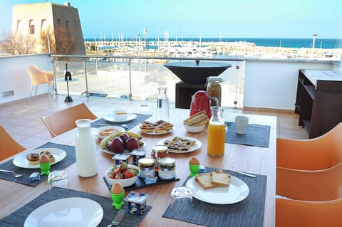 View (from property/room), Balcony/Terrace, Seating area, Dining area, Breakfast