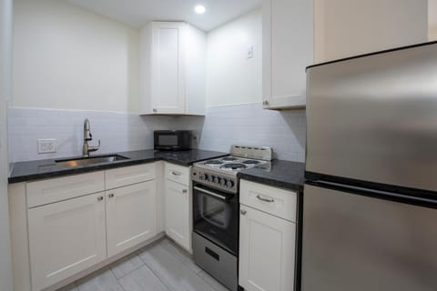 Kitchen or kitchenette, oven, stove