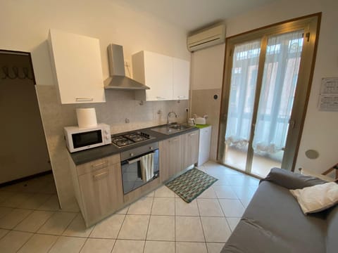Kitchen or kitchenette, oven, stove, toaster