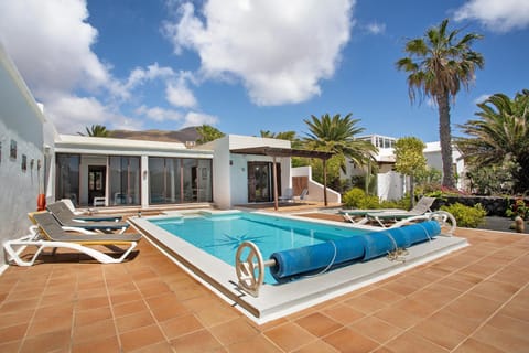 Property building, Living room, Swimming pool