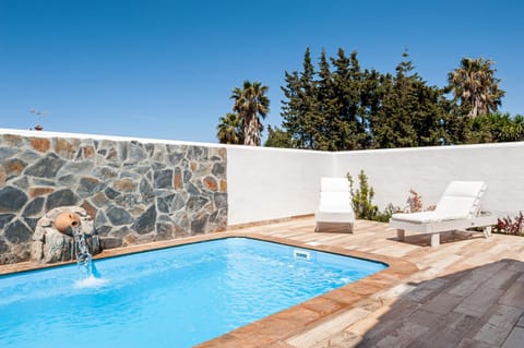 Property building, Living room, Swimming pool
