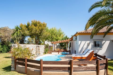 Property building, Living room, Swimming pool