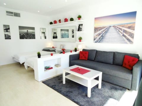 Bed, Living room, Seating area, Dining area