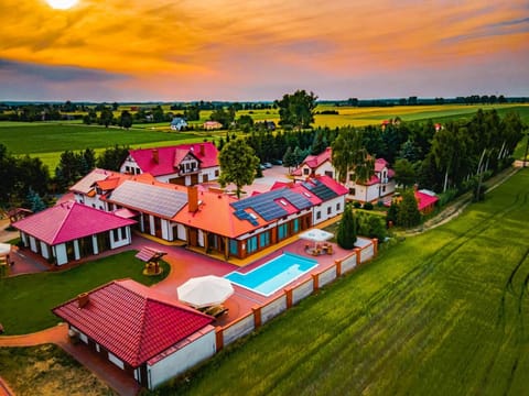 Property building, Off site, Day, Natural landscape, Bird's eye view, Summer, Balcony/Terrace, Swimming pool, Sunrise, Sunset, sunbed