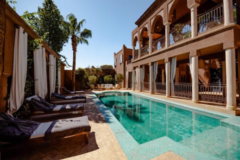Property building, Pool view, Swimming pool, sunbed