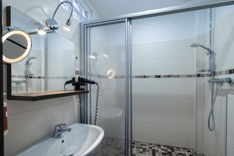 Shower, Bathroom, hair dryier, towels