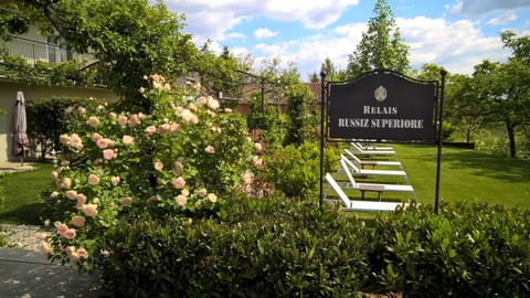 Property building, Property logo or sign, Garden, Lobby or reception