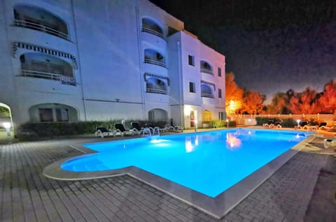 Property building, Day, Night, Pool view, Swimming pool, sunbed