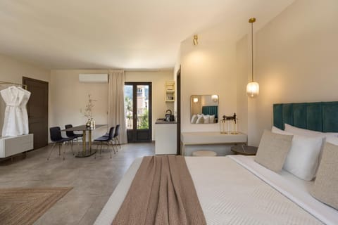 Bed, Living room, Photo of the whole room, Seating area, Bedroom, towels, wardrobe, air conditioner