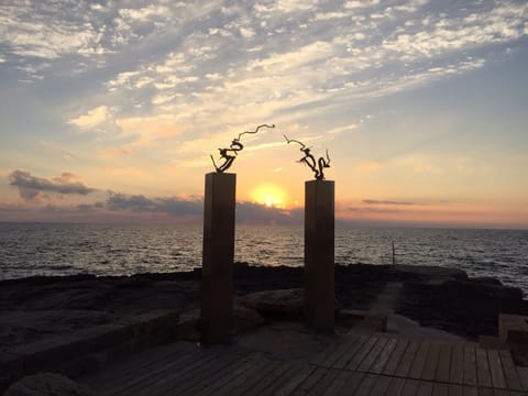 Nearby landmark, Neighbourhood, Natural landscape, Sunset