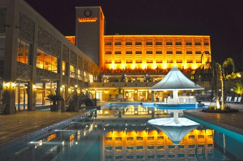 Property building, Facade/entrance, Off site, Night, Pool view, Area and facilities, Swimming pool, sunbed