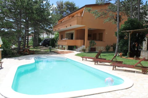 Property building, Patio, Facade/entrance, Garden, Seating area, Swimming pool, Swimming pool