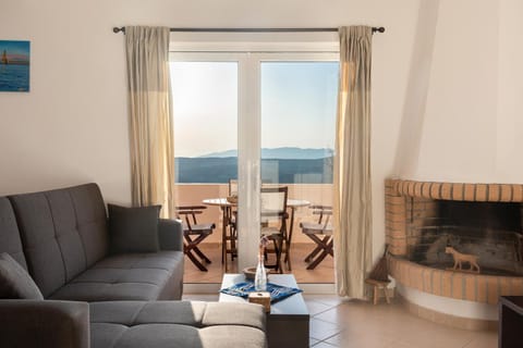 View (from property/room), Balcony/Terrace, Living room, Seating area, Dining area, fireplace