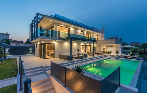 Property building, Swimming pool, Swimming pool, Sunset