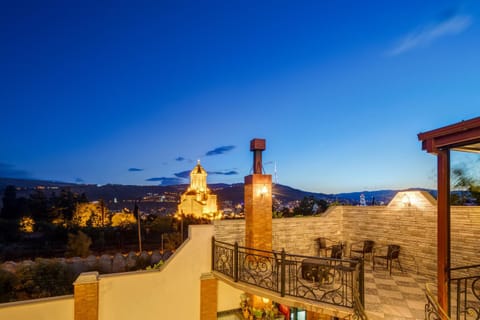 Property building, Nearby landmark, Night, Neighbourhood, Natural landscape, View (from property/room), Balcony/Terrace, City view, Mountain view, Street view, Sunset