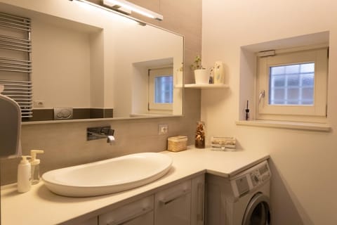 Bathroom, towels, washing machine, dryer