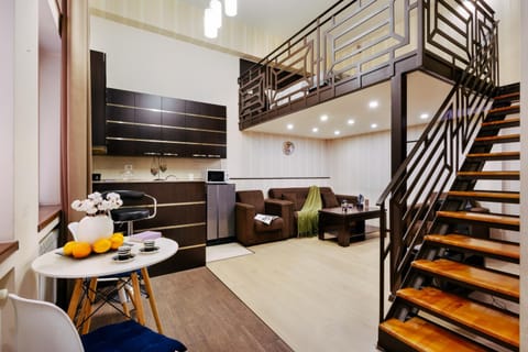 Kitchen or kitchenette, Living room, Seating area, Dining area