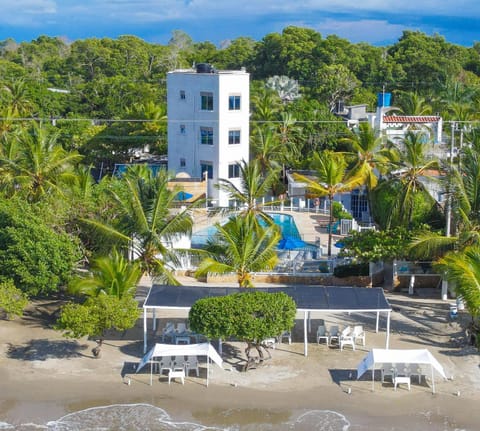 Property building, Natural landscape, Beach, Location