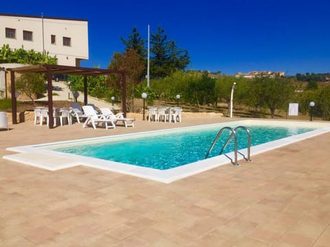 Facade/entrance, Day, Summer, Pool view