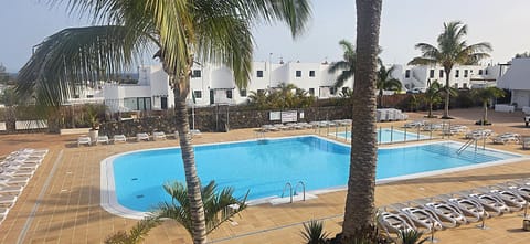 Property building, Pool view, Swimming pool, sunbed