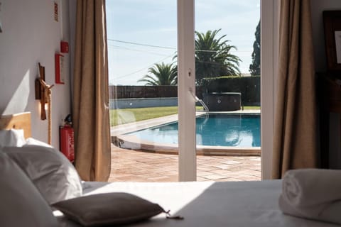 Bed, Day, Bedroom, Pool view, Swimming pool