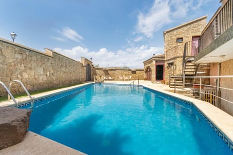Property building, Living room, Swimming pool