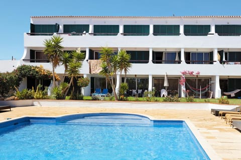 Property building, Living room, Swimming pool