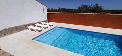 Property building, Living room, Swimming pool