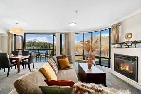 Natural landscape, Living room, Seating area, Dining area, Lake view, fireplace