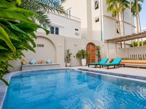 Property building, Patio, Day, Pool view, Swimming pool, sunbed
