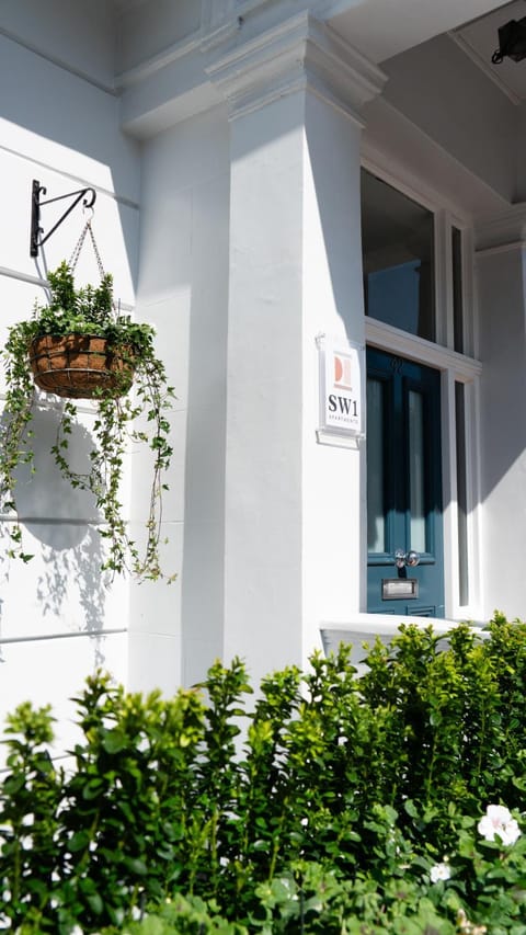 Facade/entrance, Day, Property logo or sign, Summer