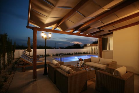 Patio, Lounge or bar, Seating area, Swimming pool