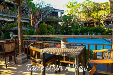 View (from property/room), Dining area, Garden view, Swimming pool