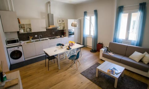 Living room, Seating area, Dining area, dishwasher, oven, stove, washing machine, dryer