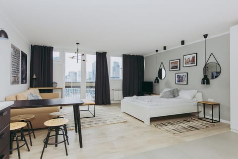 Bed, TV and multimedia, Living room, Seating area, Dining area