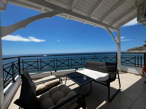 Property building, Patio, Day, Natural landscape, View (from property/room), Balcony/Terrace, Living room, Seating area, Dining area, Sea view