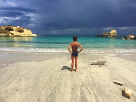 Nearby landmark, Day, People, Natural landscape, Beach, Sea view