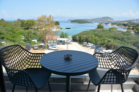 Patio, Restaurant/places to eat, Communal lounge/ TV room, Bird's eye view, Balcony/Terrace, Decorative detail, Beach, Communal kitchen, Text overlay, Mountain view, Sea view