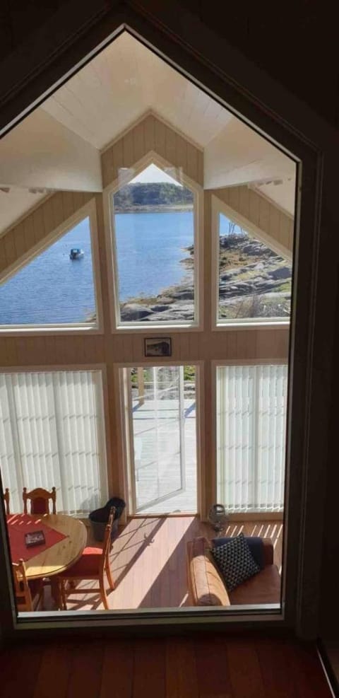 View (from property/room), Living room, Seating area, Dining area, Mountain view, Sea view