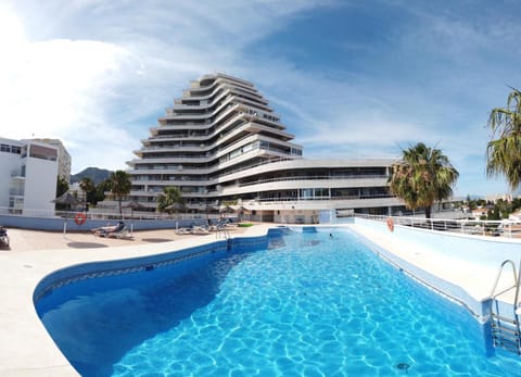 Property building, Day, Pool view, Swimming pool, sunbed