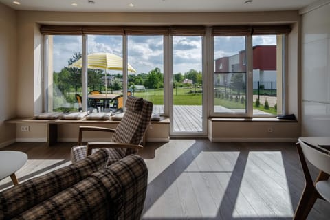 Living room, Seating area, Garden view