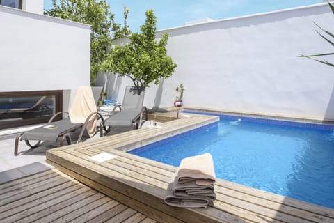 Property building, Living room, Swimming pool