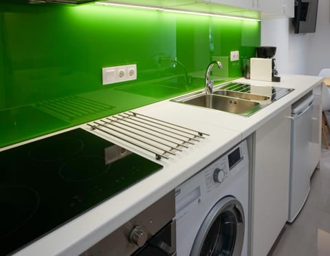 Kitchen or kitchenette, washing machine
