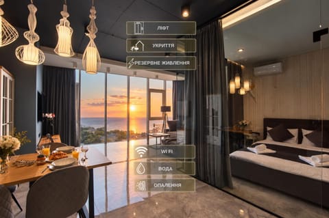 Bed, Living room, Seating area, Dining area