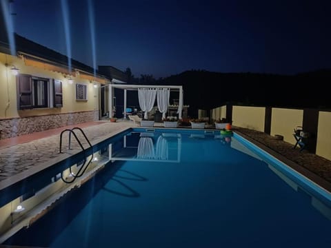 Property building, Night, Pool view, Swimming pool, sunbed
