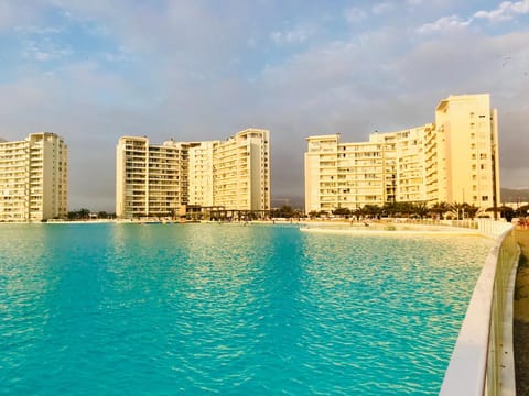 Property building, Staff, Facade/entrance, Off site, Day, People, Summer, On site, Guests, Swimming pool, Location, Sunset, children, young children, older children, group of guests, Family